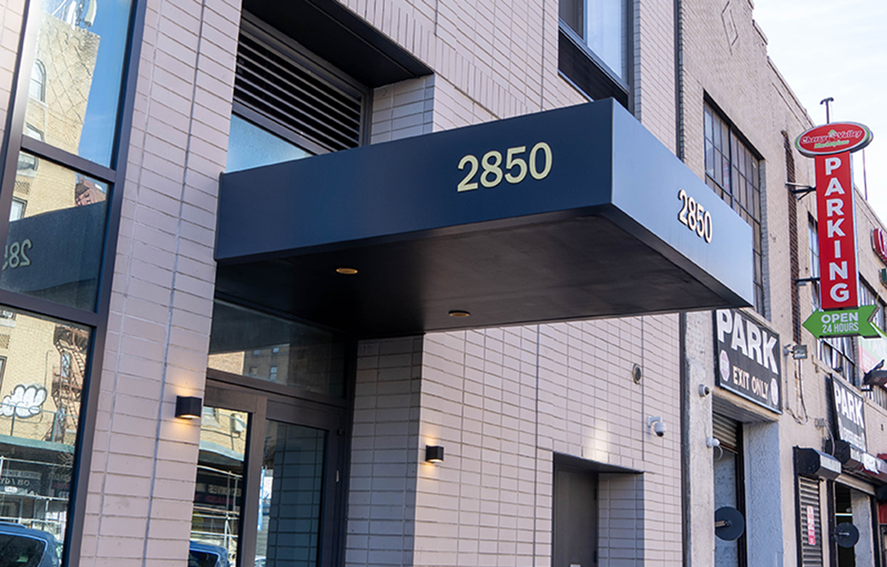 Wells Fargo and Douglaston Development celebrate Phase I of 2850 Webster Ave. with grocery gift card donations